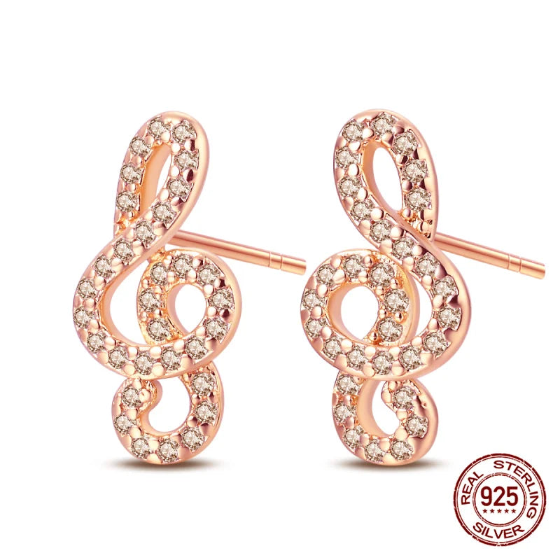 Clef Symbol Silver Studded Earrings