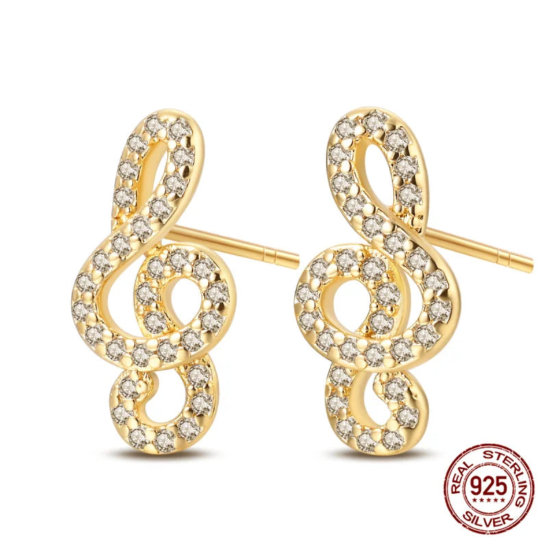 Clef Symbol Silver Studded Earrings